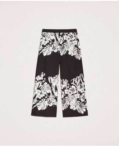 Pantaloni cropped ampi grafico nero donna con stampa a fiori | TWINSET Pantaloni cropped ampi grafico nero donna con stampa a fiori | TWINSET