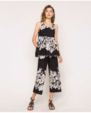 Pantaloni cropped ampi grafico nero donna con stampa a fiori | TWINSET Pantaloni cropped ampi grafico nero donna con stampa a fiori | TWINSET
