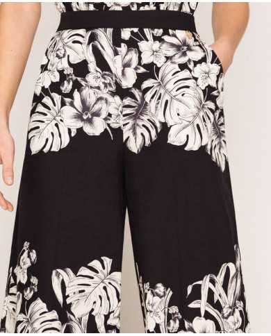 Pantaloni cropped ampi grafico nero donna con stampa a fiori | TWINSET Pantaloni cropped ampi grafico nero donna con stampa a fiori | TWINSET