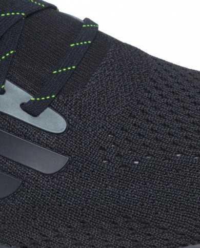 sneakers nero da uomo logato con dettagli giallo fluo | EA7