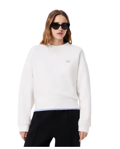 LACOSTE Felpa Donna SF5614 AI 25/26 cotone oversize con logo applicato sul petto. 001 BIANCO LACOSTE Felpa Donna SF5614 AI 25/26 cotone oversize con logo applicato sul petto. 001 BIANCO